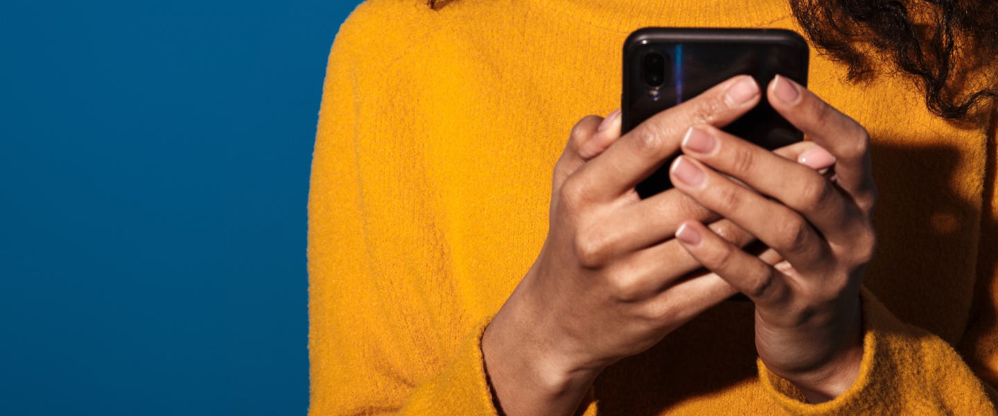 Photo of person holding a cell phone 