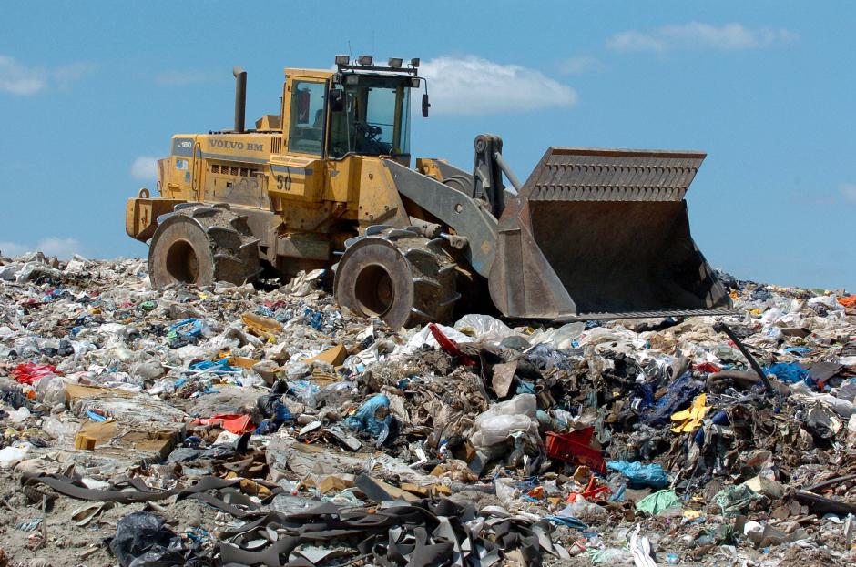 Landfill site with heavy plant machinery