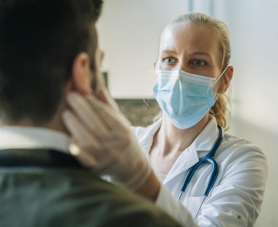 Doctor examining a patient