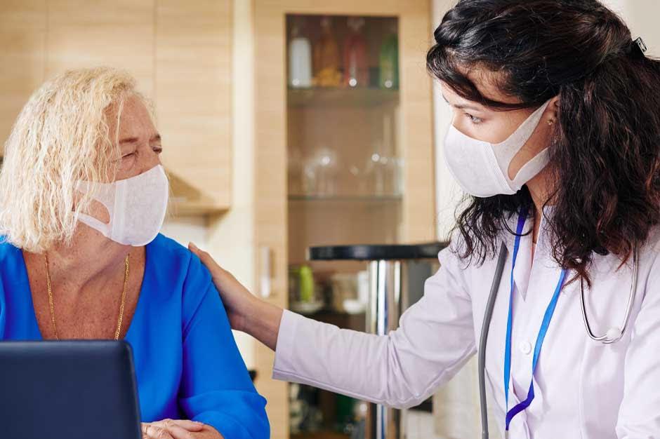 woman with mask and doctor